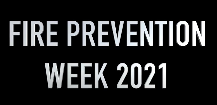 Text reading "FIRE PREVENTION WEEK 2021" in bold, white capital letters on a solid black background.